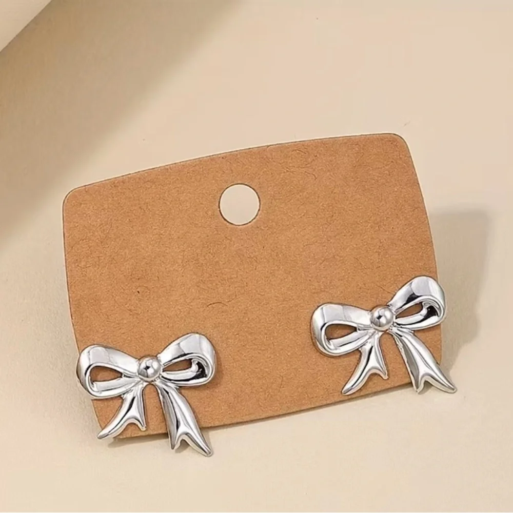 Silver Bow Earrings - Picture 1 of 3